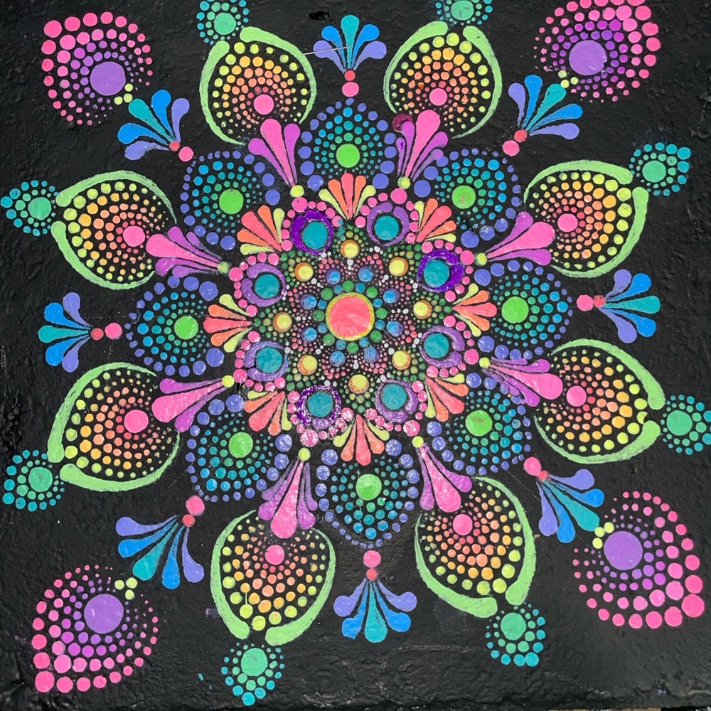 Colorful Mandala Art on Black Mandala painted rocks